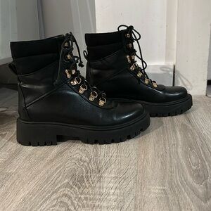 Black combat boots, size US 7.5